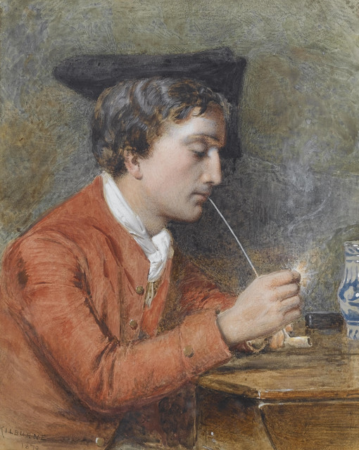 A man lighting a pipe