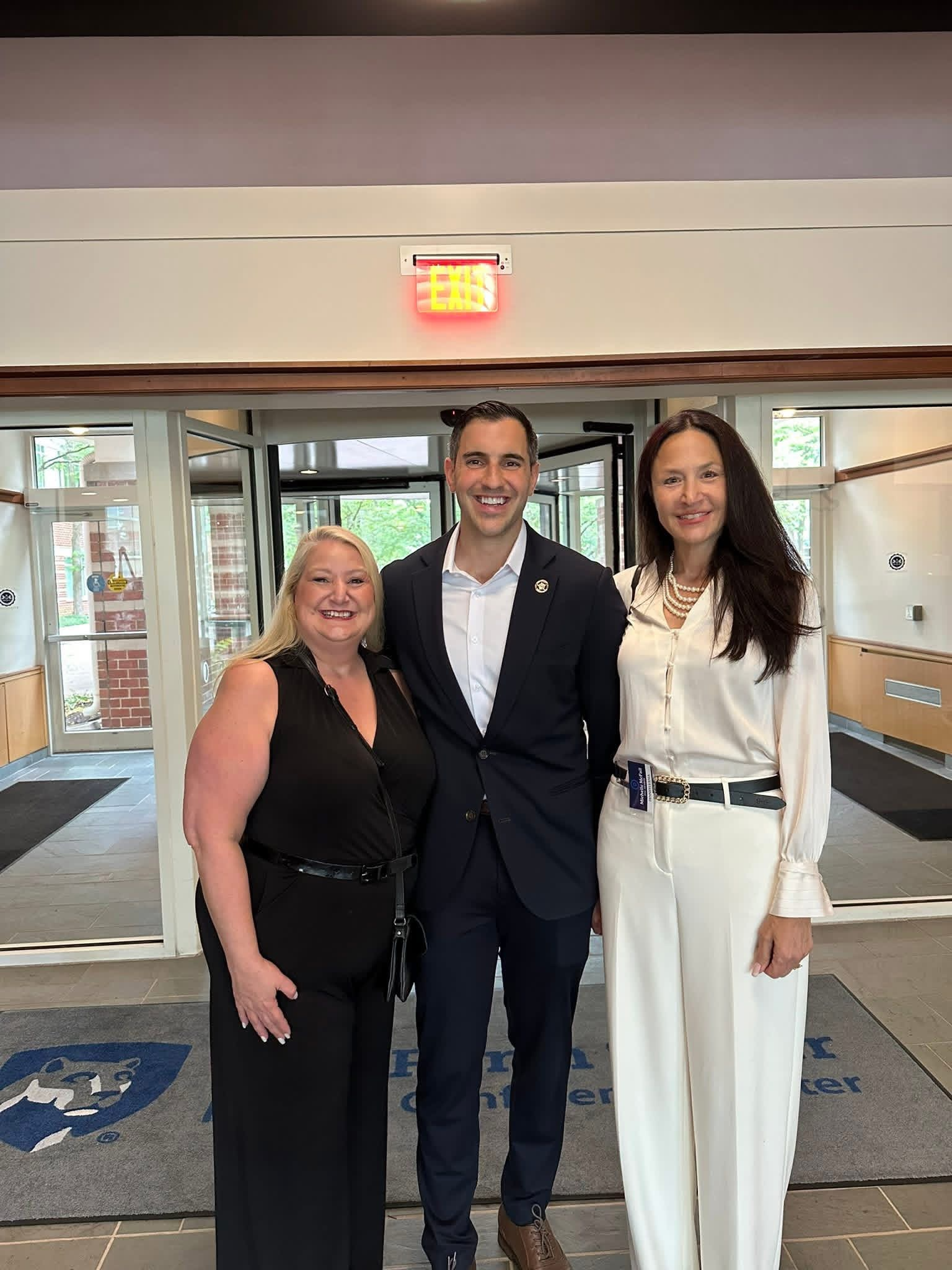 Michelle Milan McFall with fellow Democrats