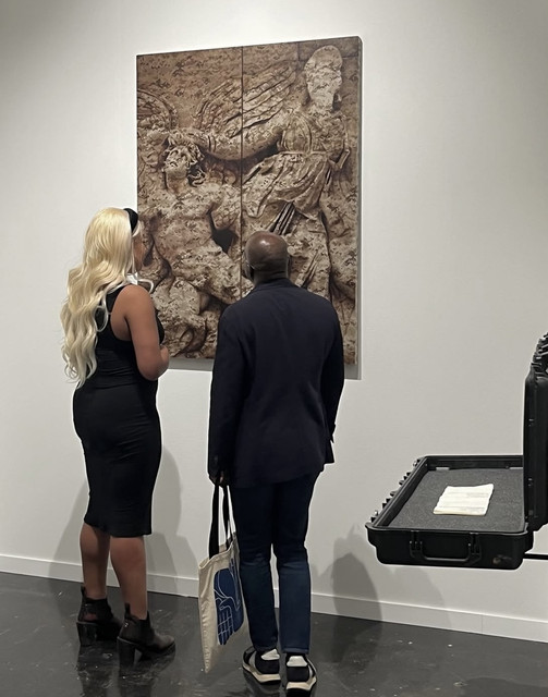 Myself and collector viewing the artwork