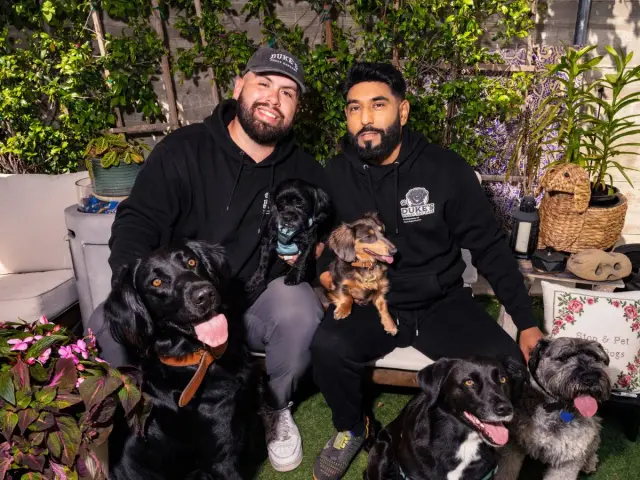 Alex and Ivan with Duke at Duke's Doggy Daycare