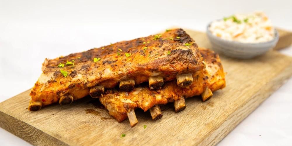 Voorgegaarde spareribs - Biologische Duroc varkens spareribs - www.Vleeskopenbijdeboer.nl