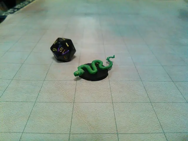 Giant Venomous Snake - https://www.printables.com/model/935575-the-updated-dd-monster-manual-collection