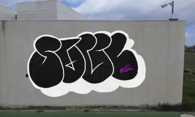 Graffiti artwork by Village