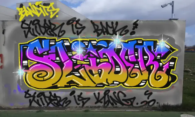 Graffiti artwork by Tkiz