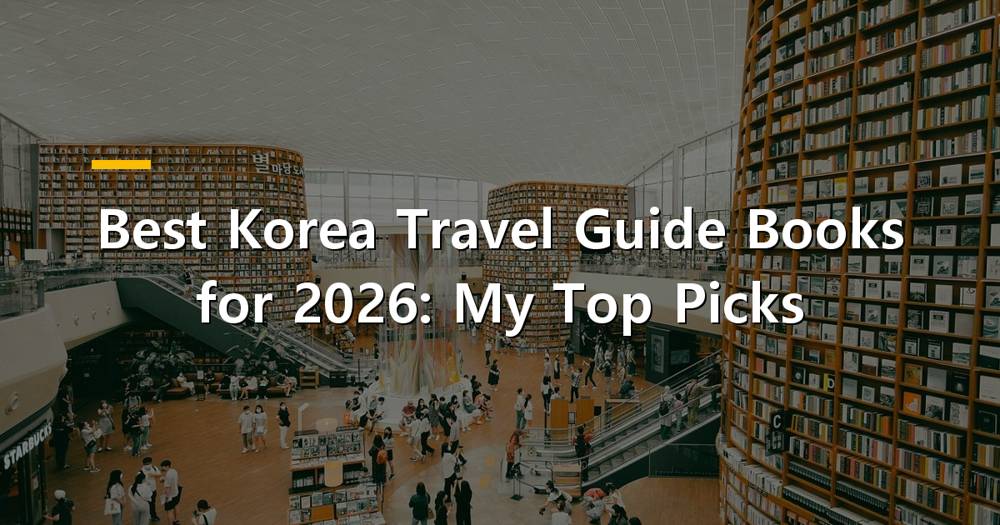 Colorful travel guide books stacked with a backdrop of Seoul's Namsan Tower