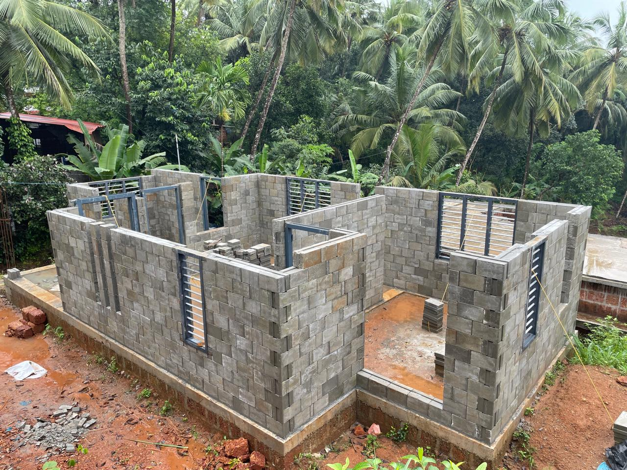 Multi-story concrete frame building with bricks