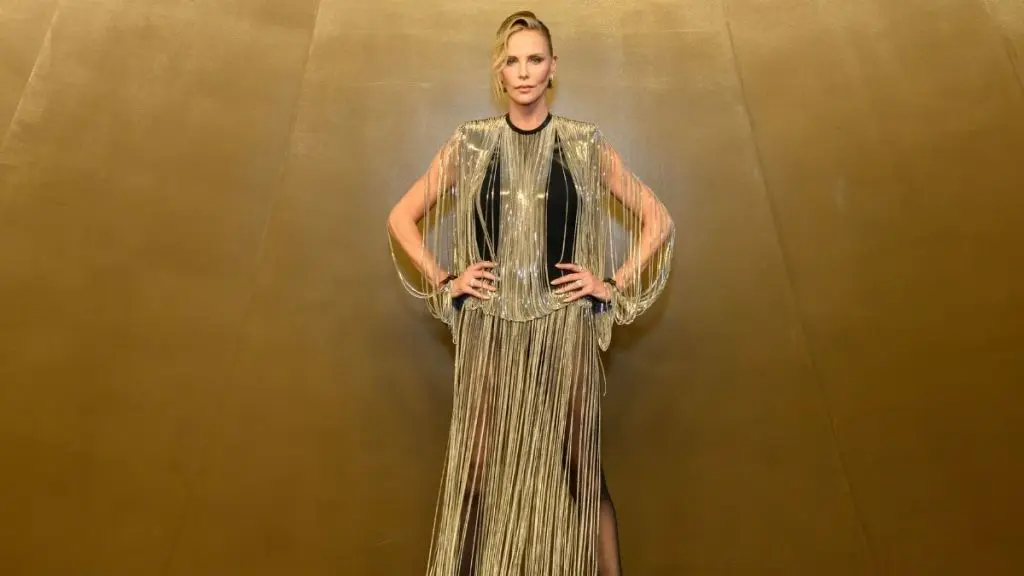 Charlize Theron Dazzles in Sheer Louis Vuitton at Beijing Premiere