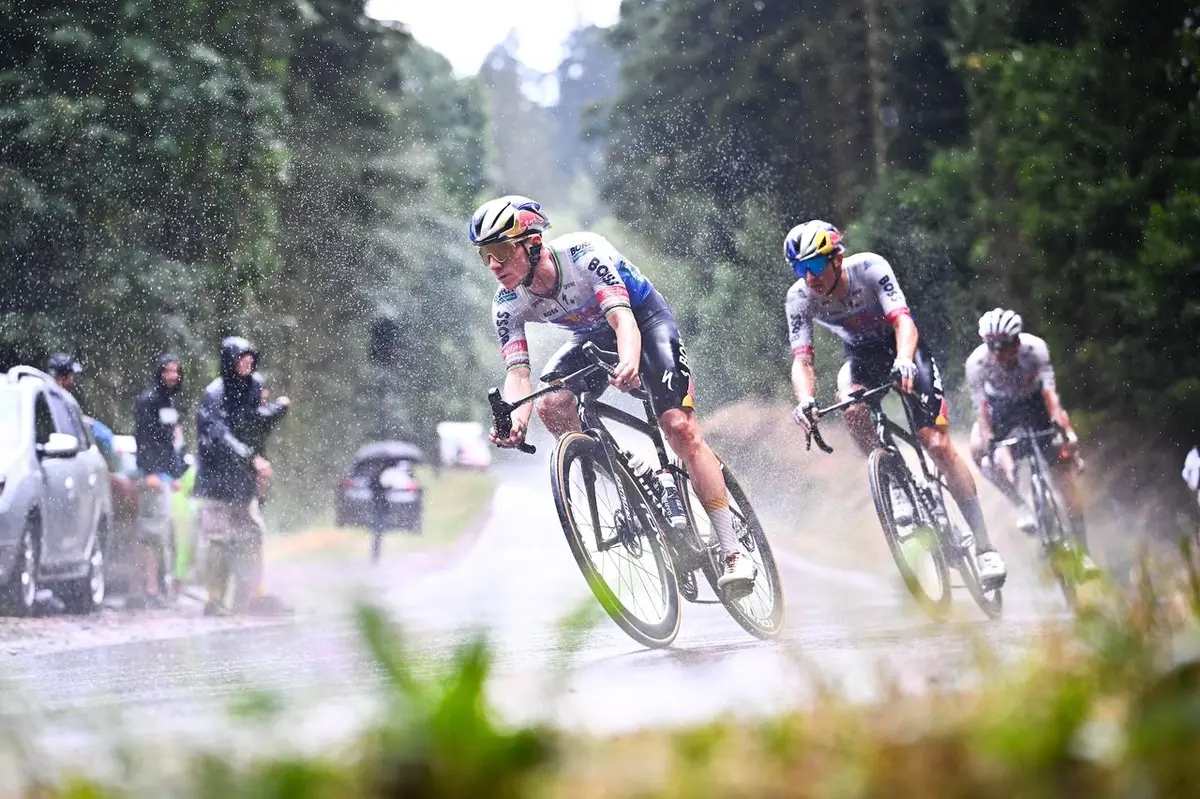 Remco Evenepoel Fights Through Rain to Keep Tour de France Podium Spot