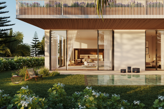 Modern luxury villa with floor-to-ceiling windows, private garden, and pool at sunset, representing ORIA Real Estate Advisors’ award-winning properties celebrated at the LeadingRE Global Symposium.