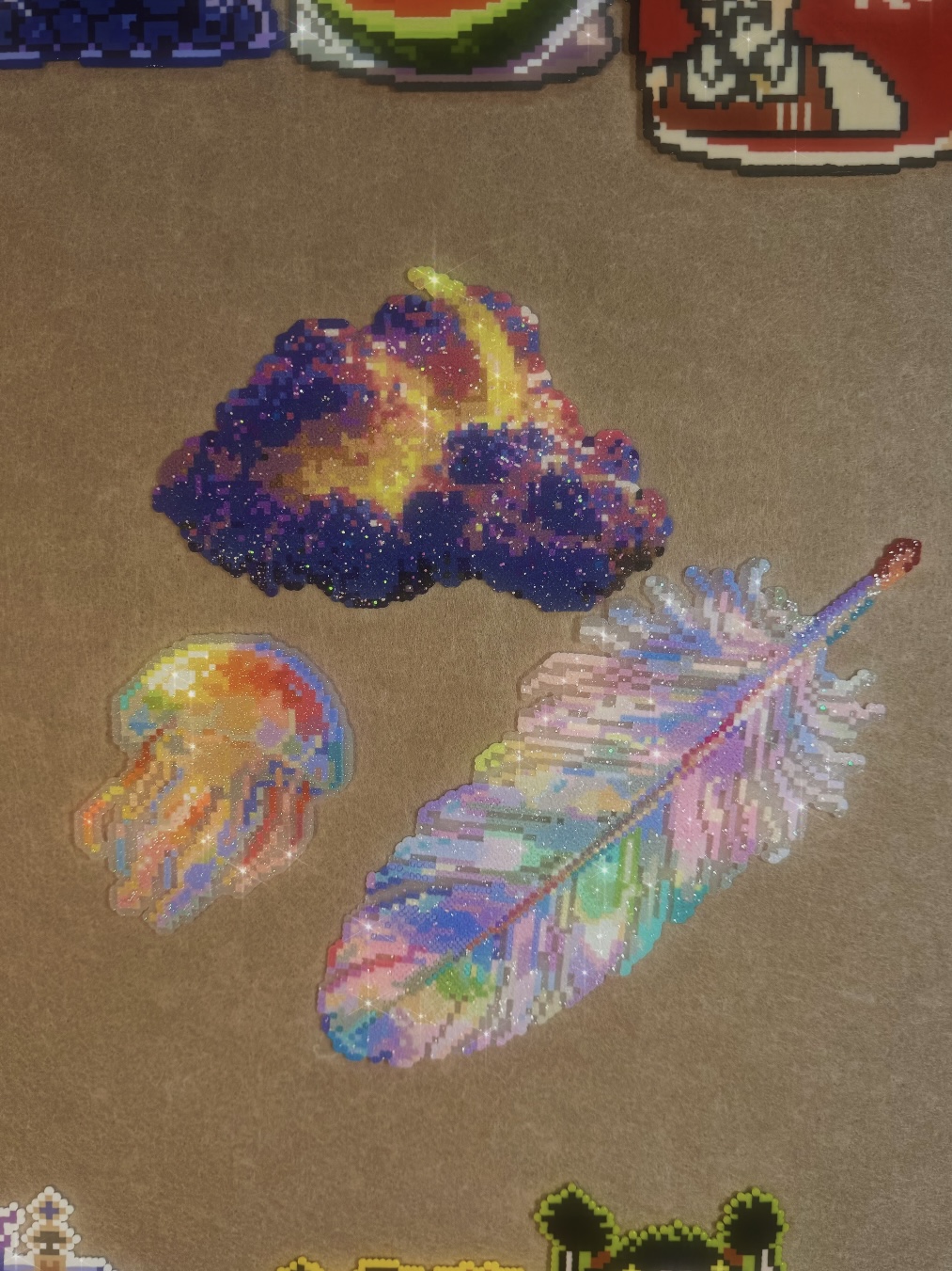 Fine glitter heat transfer sheet method on Perler beads creating soft shimmering finishvvv
