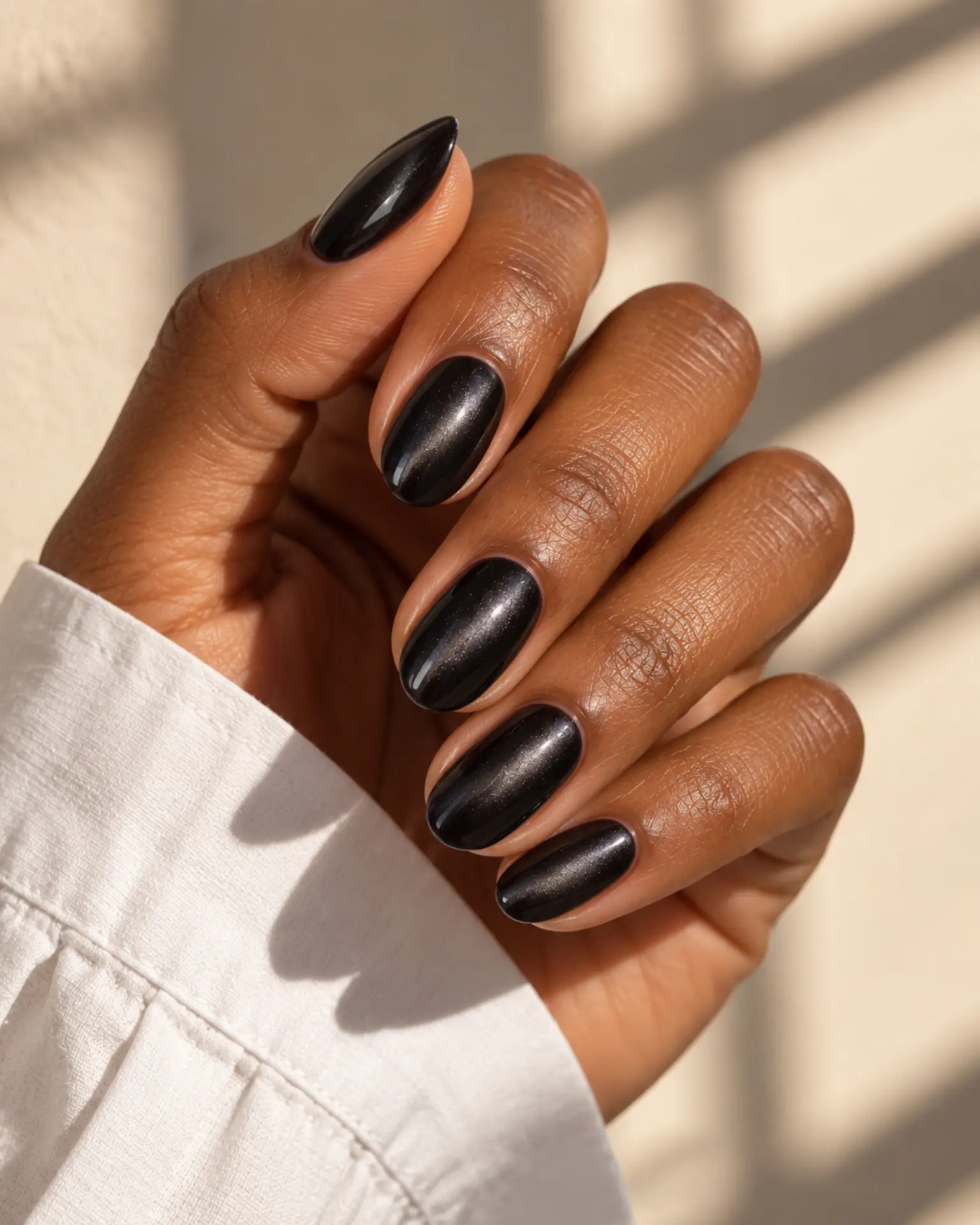 Black Velvet Cat-Eye manicure inspiration for black nail ideas