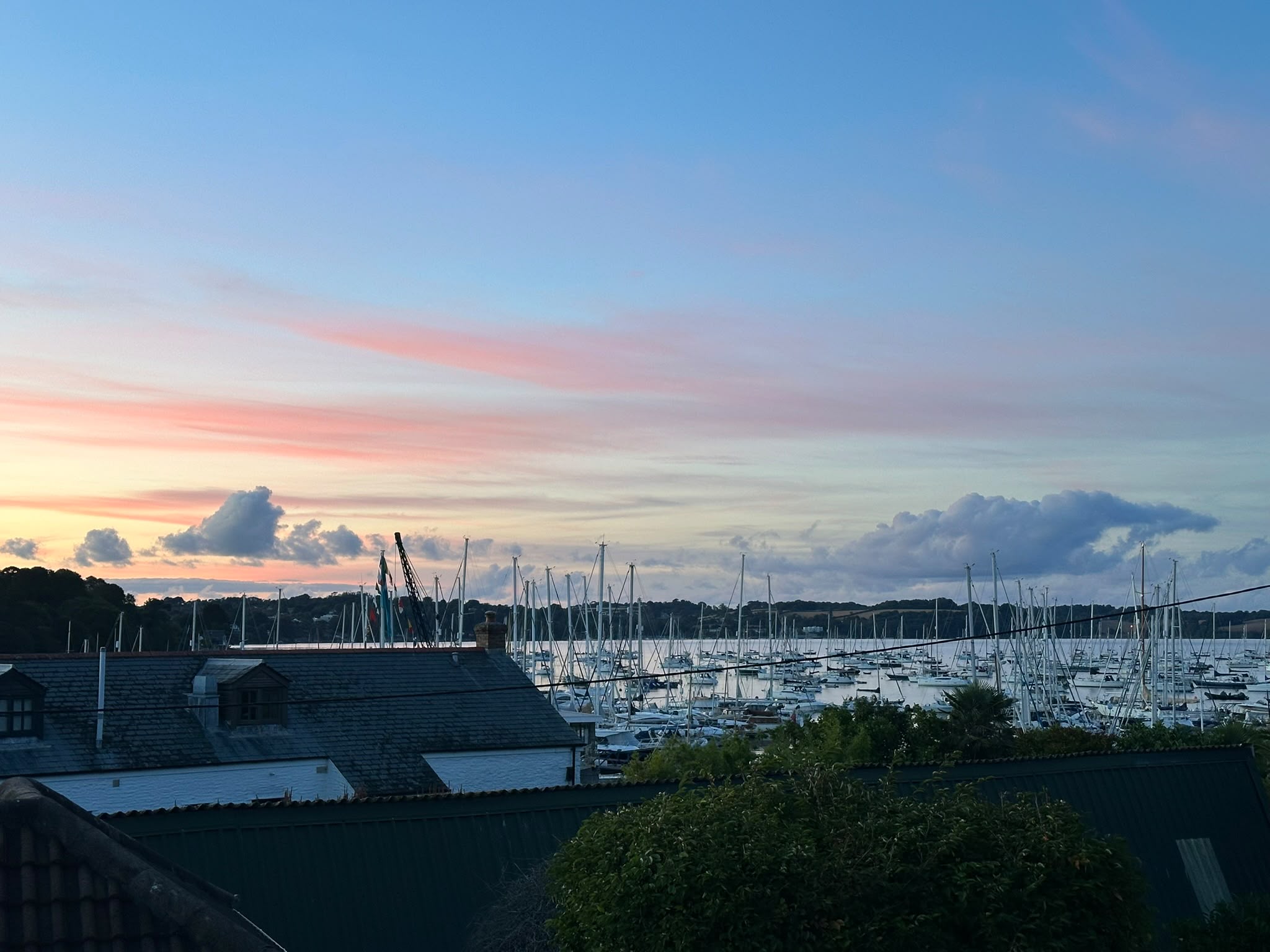 Pink and blue sunset over Mylor marina from Pondhu