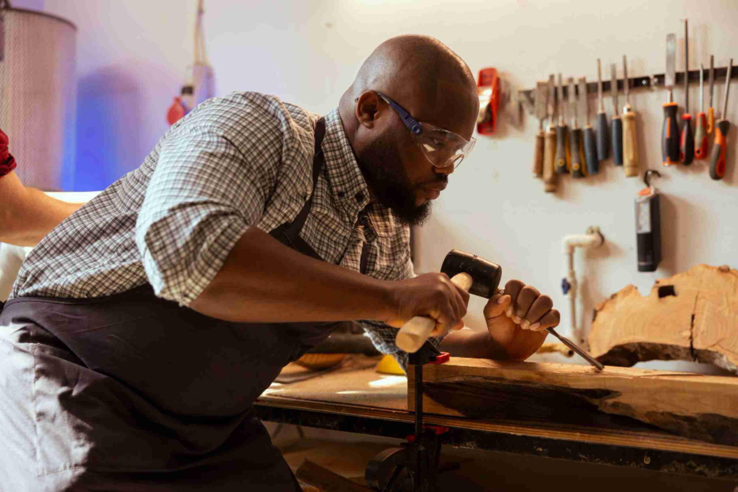 An image showing a focused artisan at work. 