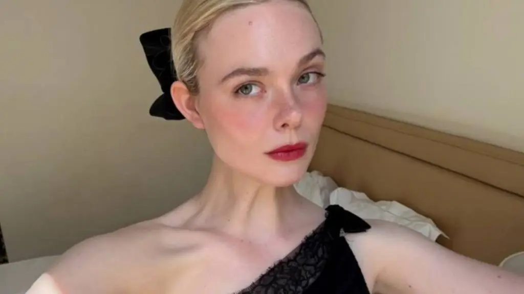 Topless by the Pool: Elle Fanning's Sun-Kissed Getaway