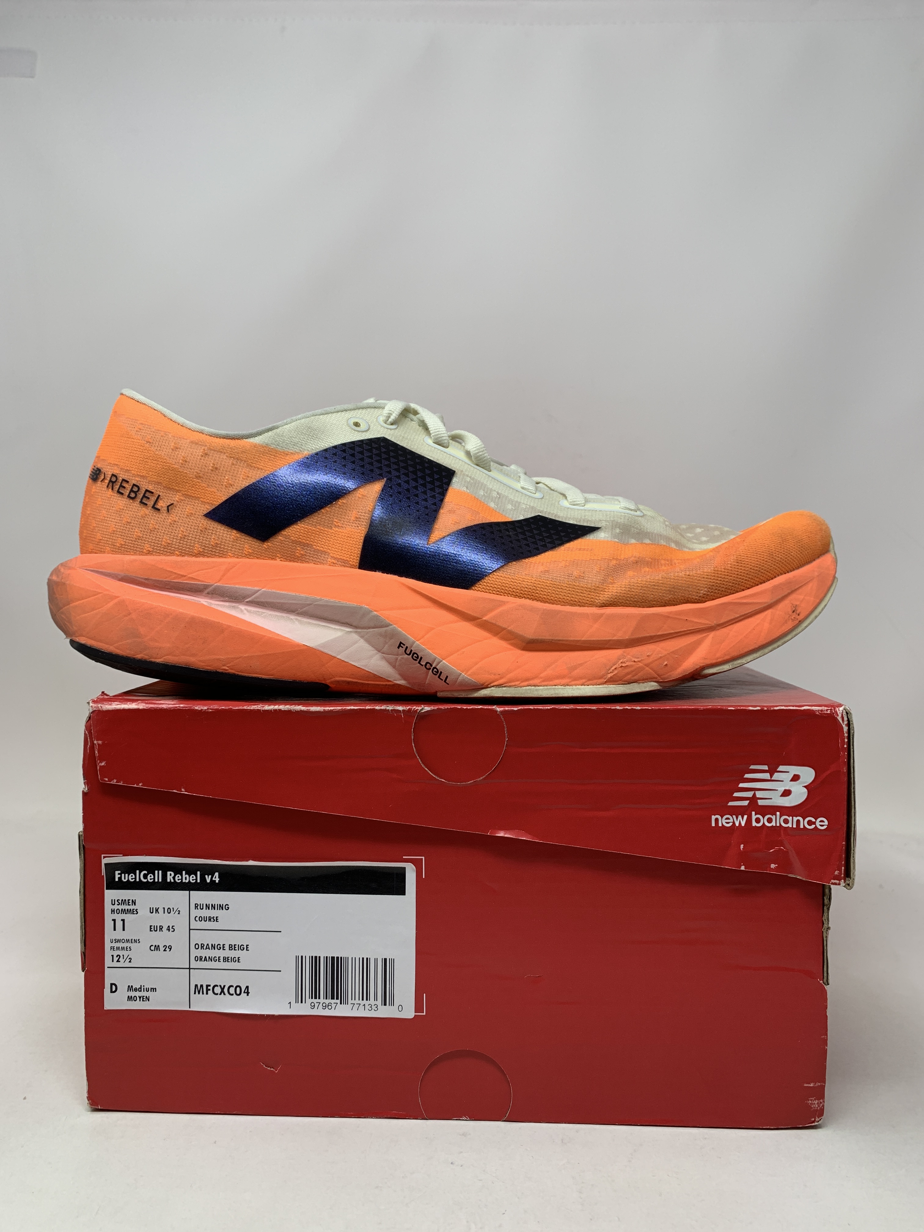 Men's New Balance FuelCell Rebel v4, Hot Mango/Angora/Black, 11 D Medium US detailed image 1