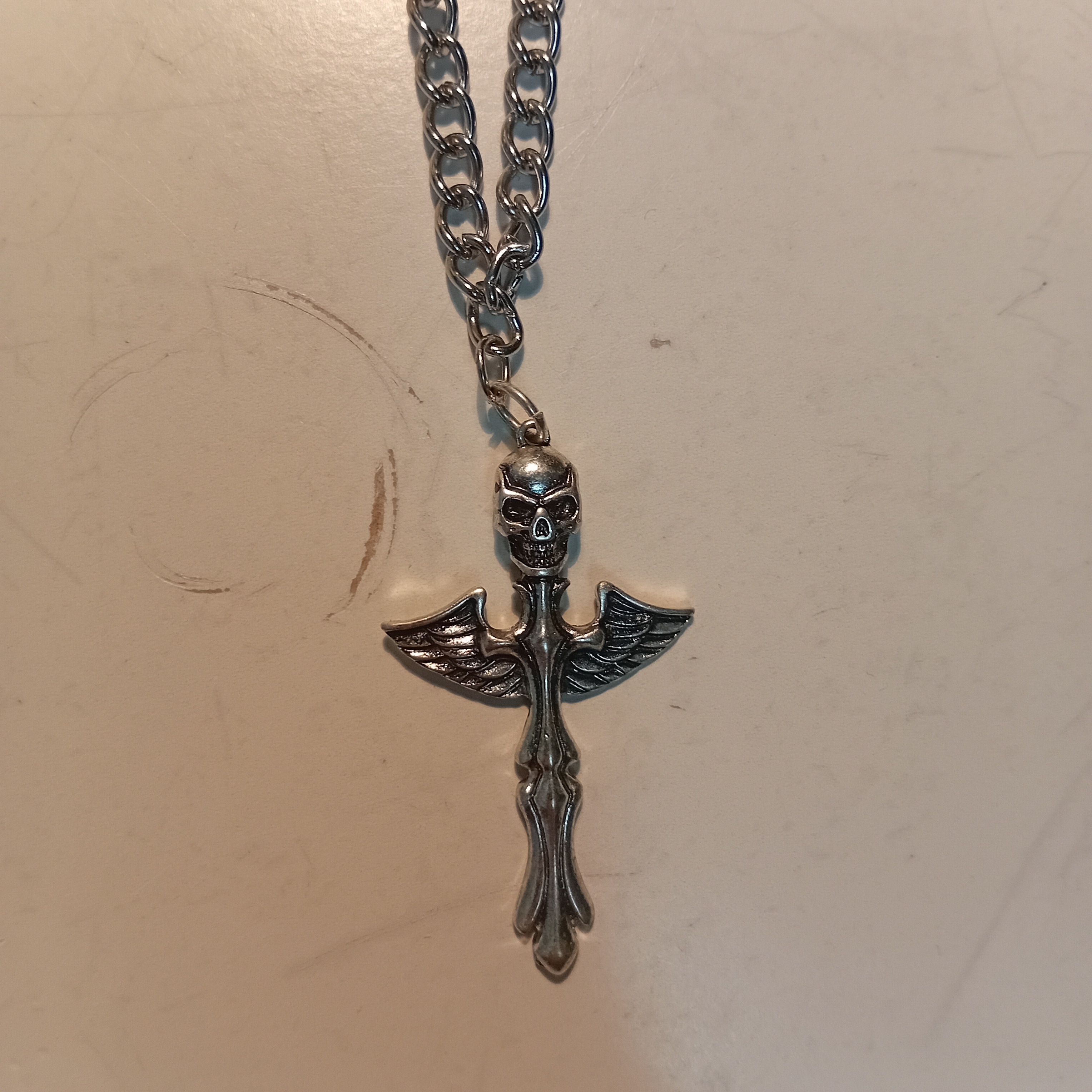 skull sword with wings