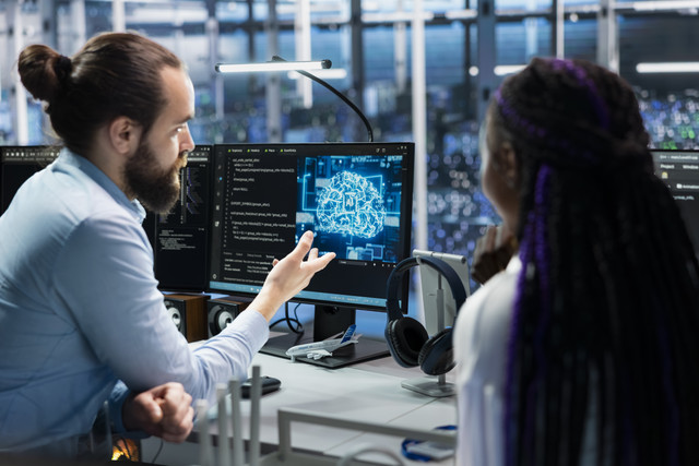 data center programmers collaborating working neural networks ai databases.jpg