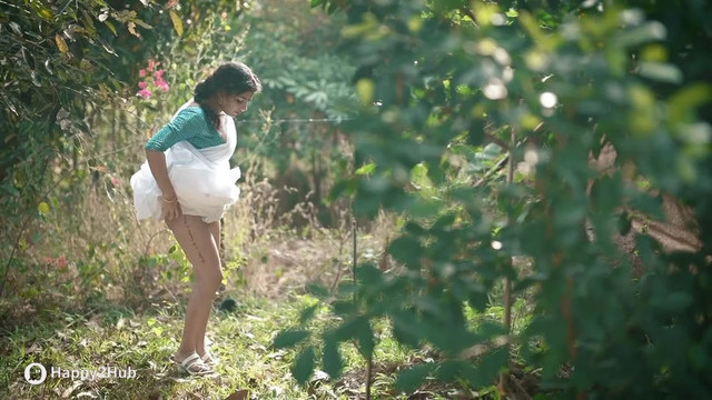 Resmi-R-Nair-Teasing-In-White-Saree-17