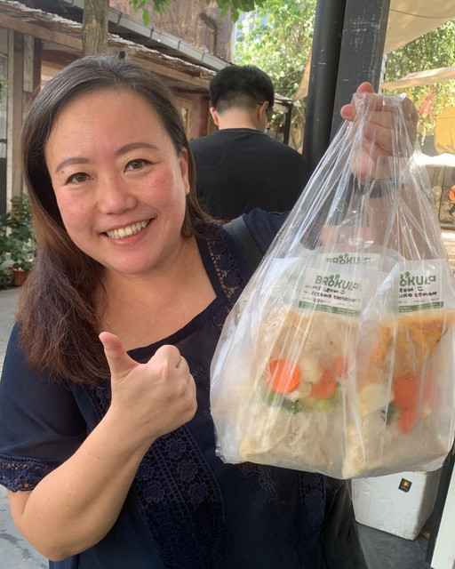 Customer enjoying Brokula meal 4