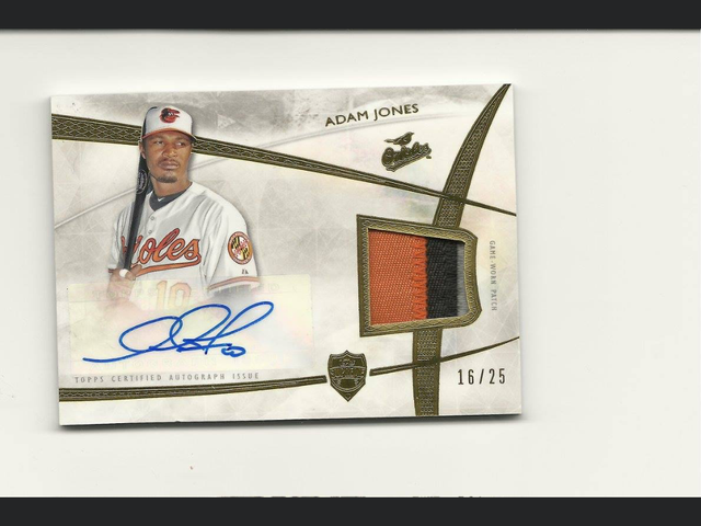 2014 Topps Supreme Adam Jones Patch Autograph /25.png