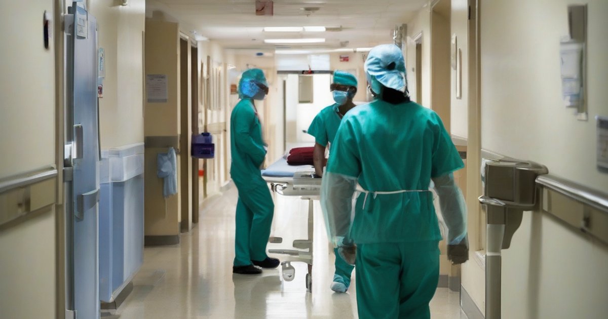 Health workers inspecting a hospital ward for dengue preparedness and patient monitoring
