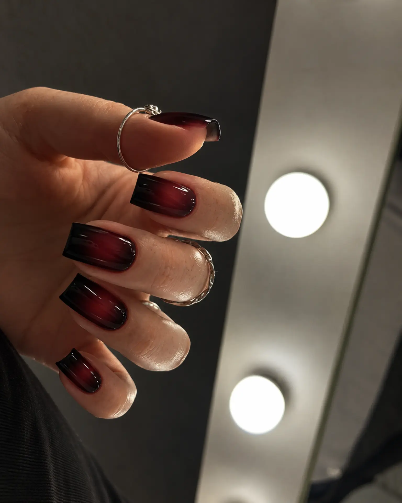 Black-to-Burgundy Aura manicure inspiration for dark aura nail ideas