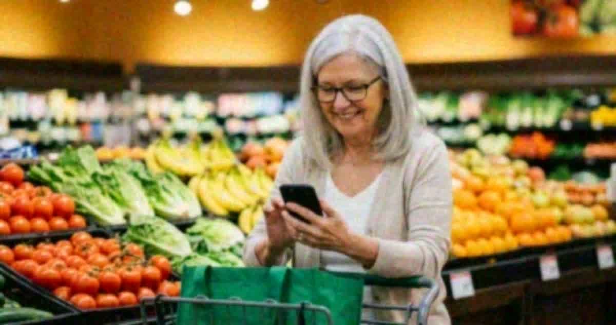 Happy woman in supermarket