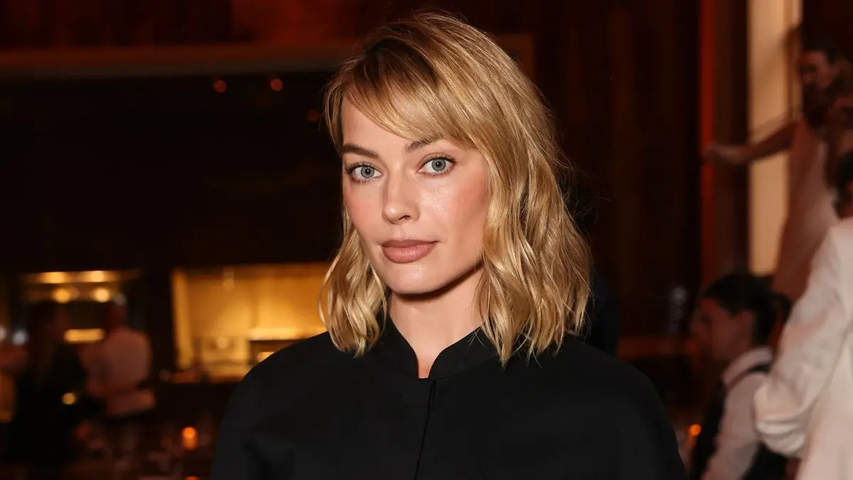 Margot Robbie Wears Tricky Shorts Trend With Heels in London Heatwave