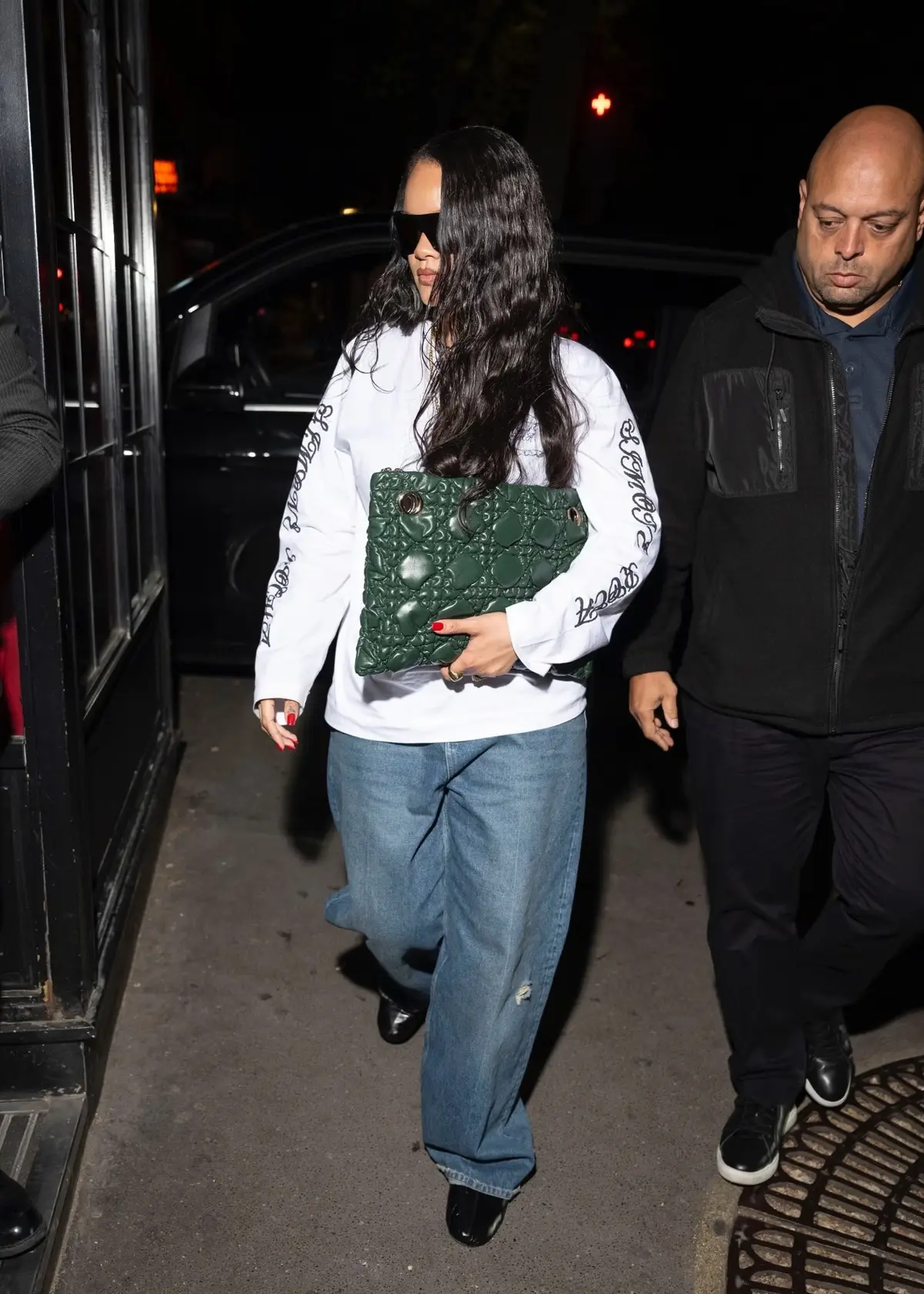 Rihanna’s Green Dior Bag Completes Nighttime Outfit