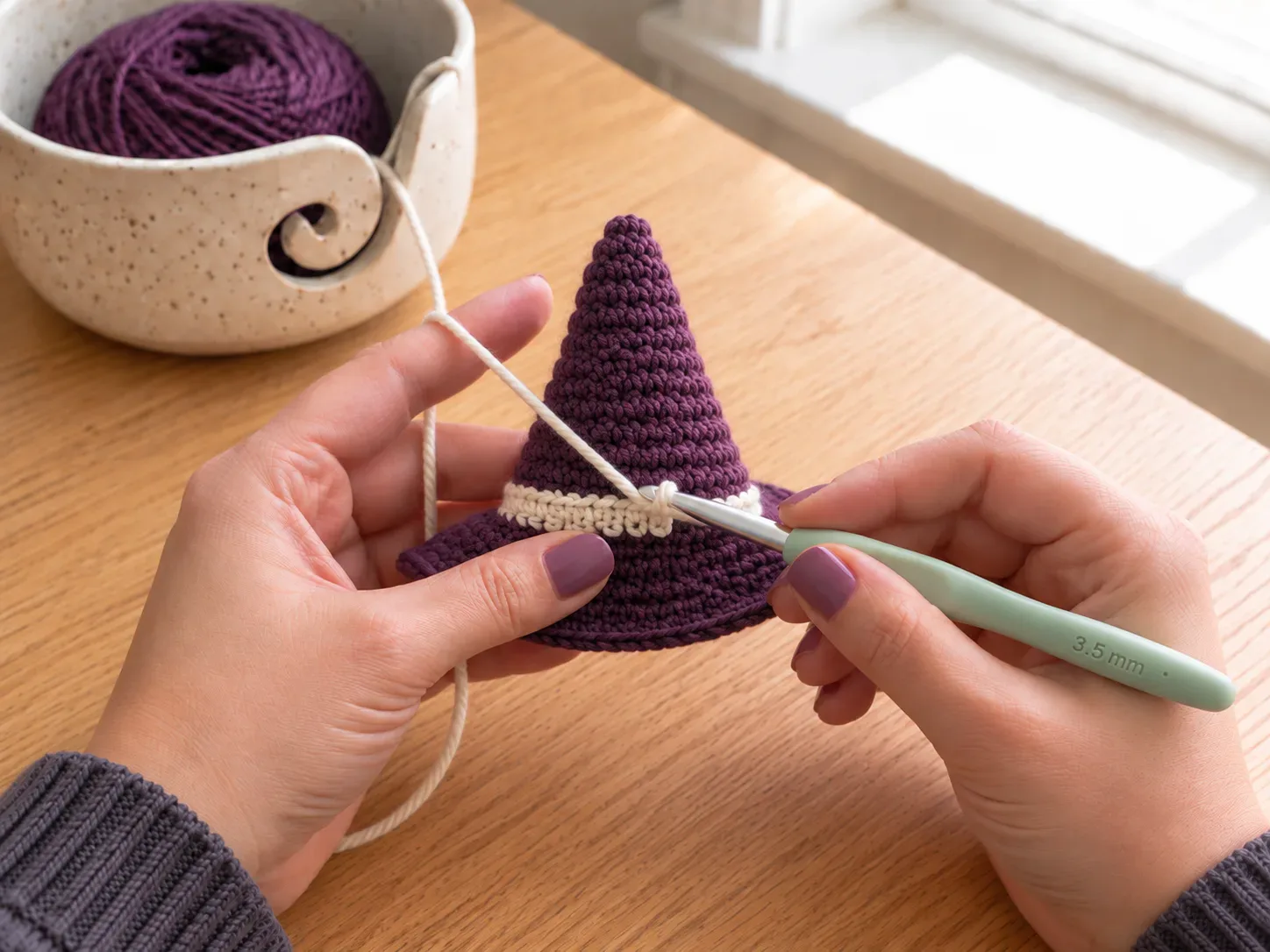 Add the band — Finish with a tiny accent band or bow detail around the base of the cone.