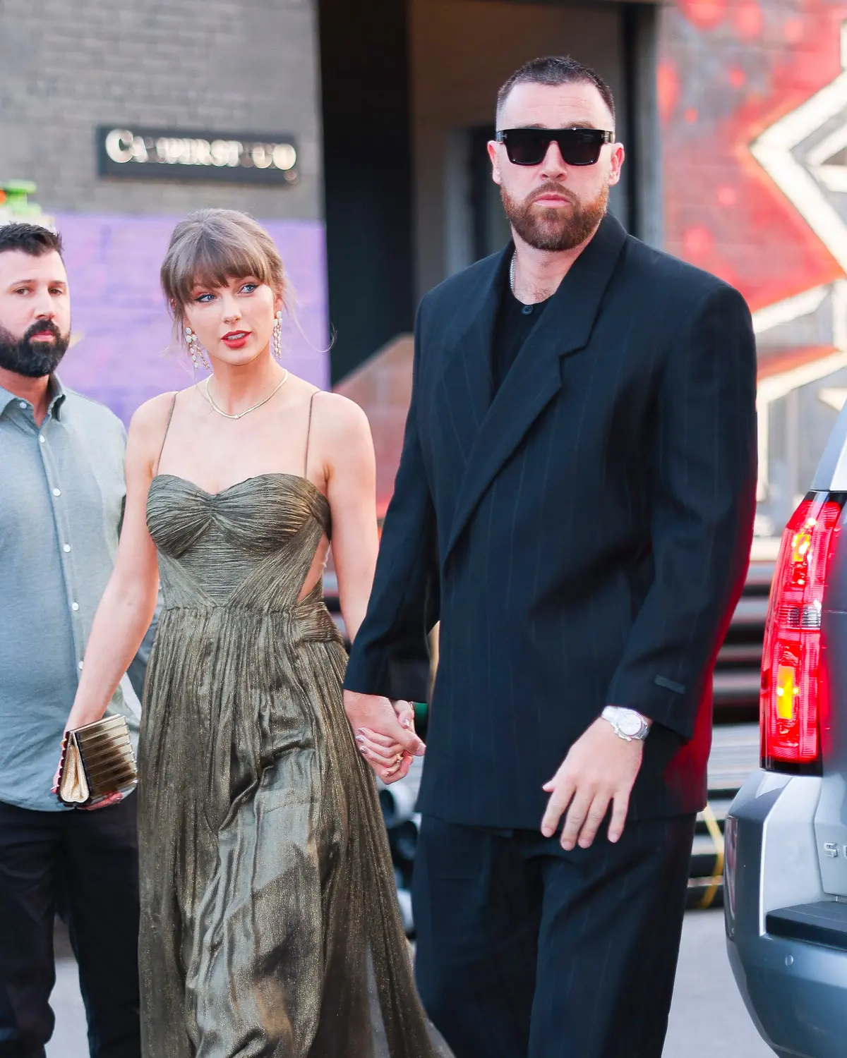 Pop Superstar Attends Teammate's Wedding in Floral Brocade