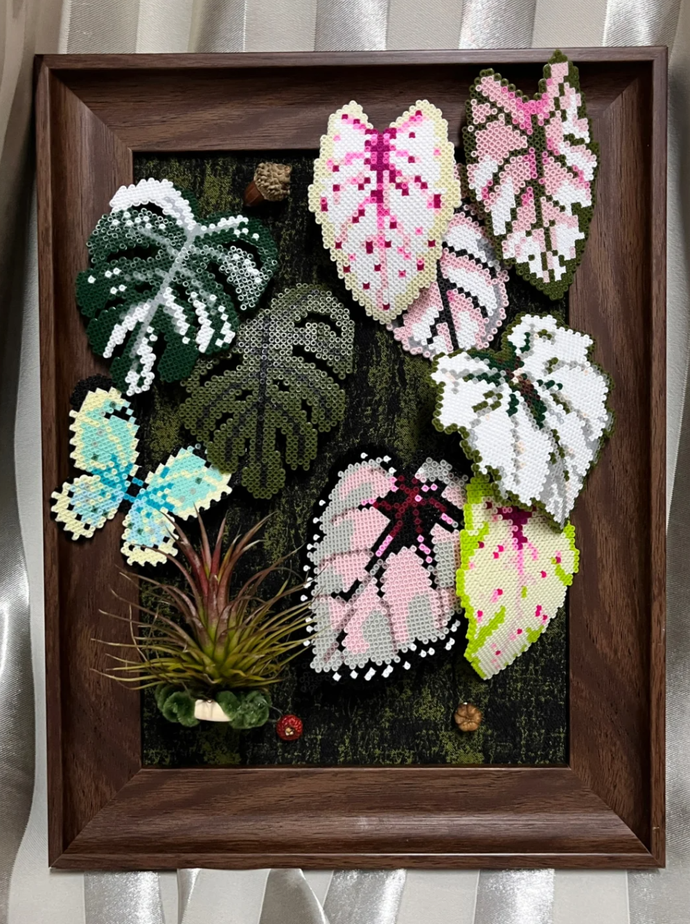 Create unkillable indoor greenery with these plant perler bead patterns. From monstera leaves to tiny succulents, learn how to turn botanical photos into custom fuse bead art using a free pattern generator.