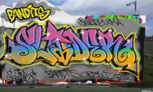 Graffiti artwork by Tkiz