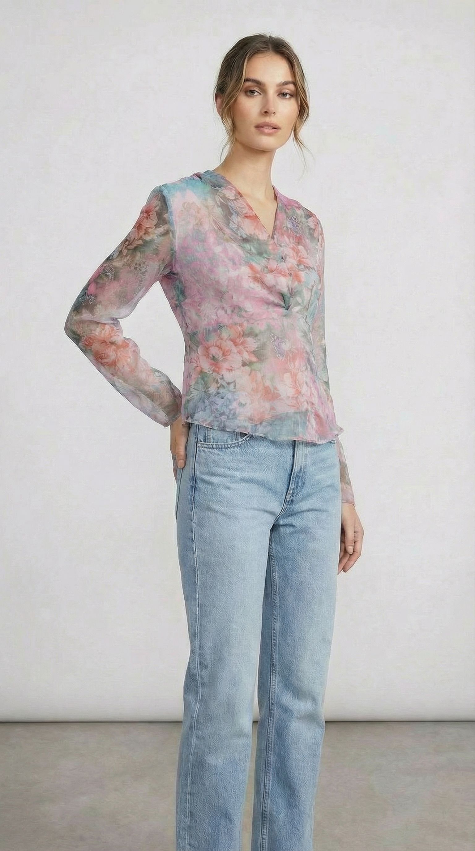 Model wearing a custom floral top and jeans