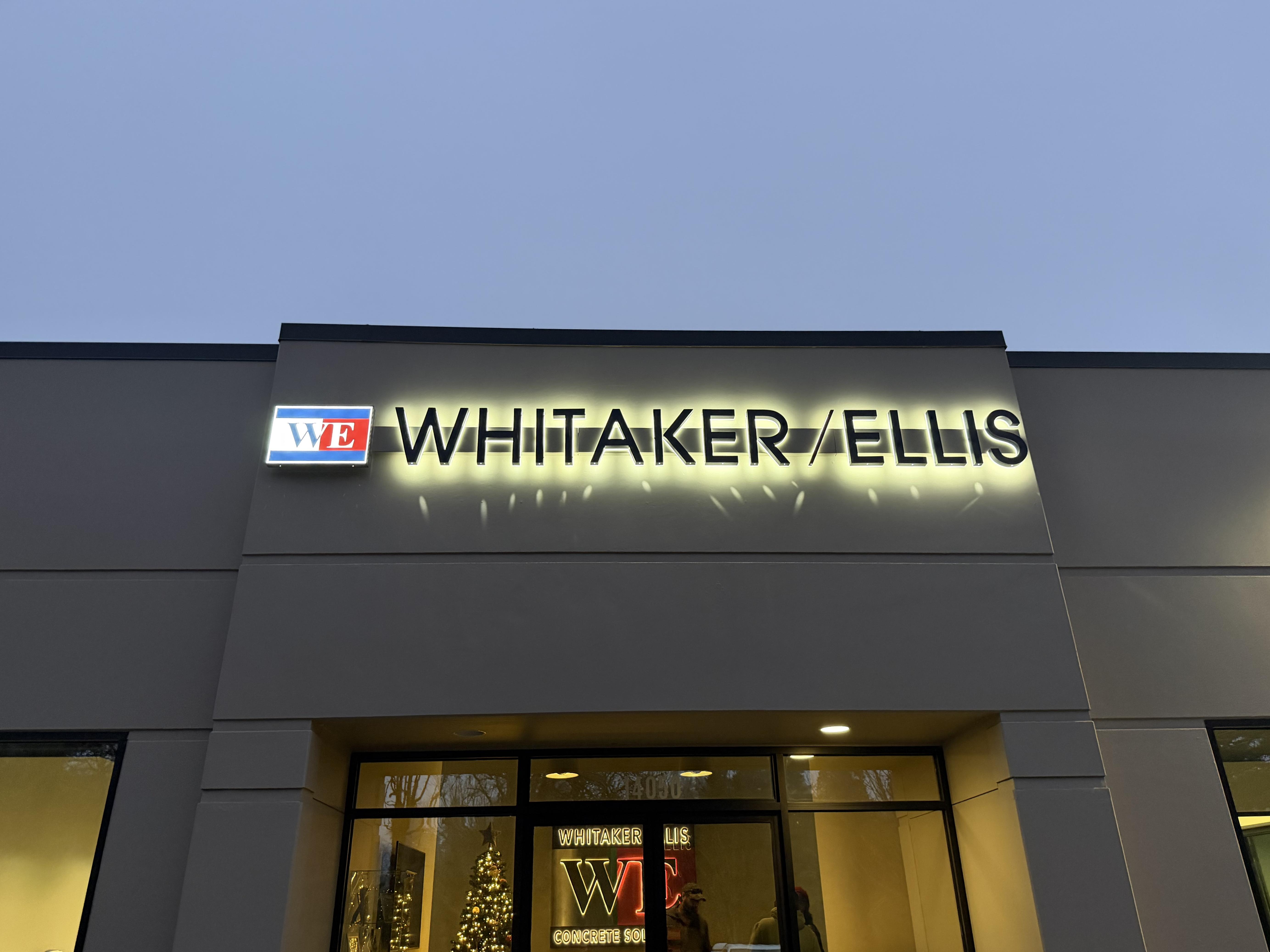 Backlit metal letters on a raceway, exterior building signs and outdoor business signs for buildings - quicksignage.com