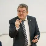 Rectorul Universității din București compară alegerea premierului cu numirea unui antrenor la FCSB